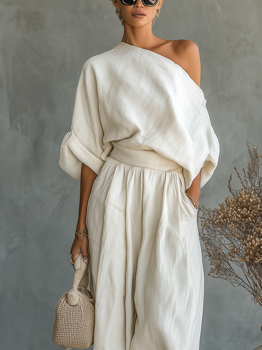 Blanca | Conjunto de lino en color blanco roto para mujer, con top con hombros al aire y pantalones ajustados